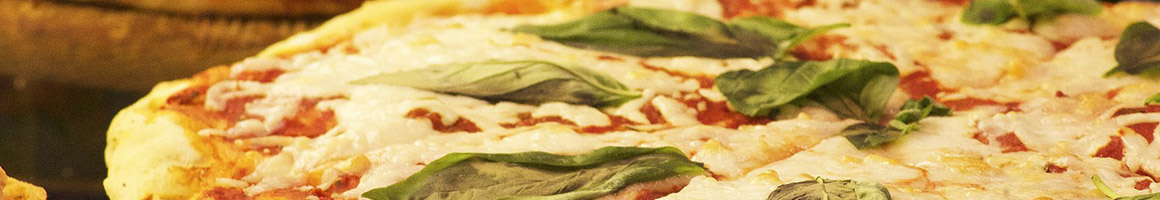 Eating Italian Pizza at Bella Italia restaurant in Annapolis, MD.